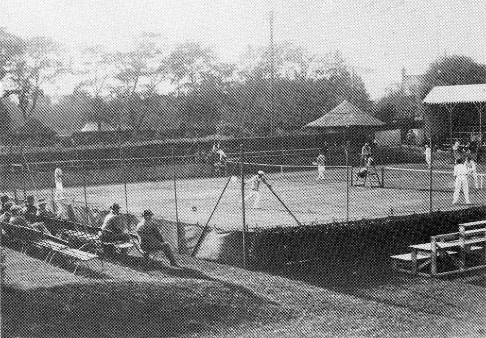 Autumn Hard Court Tournament Semi-finals of the Ladies' and Gentlemen's Level Doubles. Taken from behind used to be (Belstead Courts) looking towards the Office; 1920's